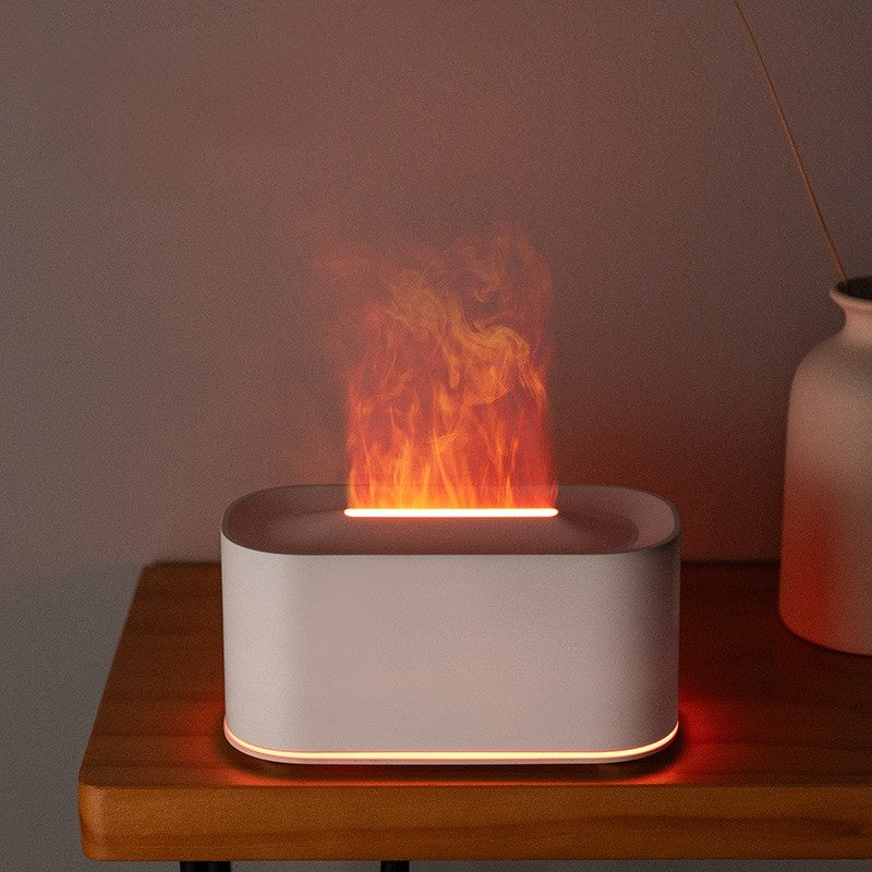 Fireplace Flame Aroma Diffuser with Remote Control and Humidifier
Difusor de aromas con forma de llama de chimenea, con control remoto y humidificador.
