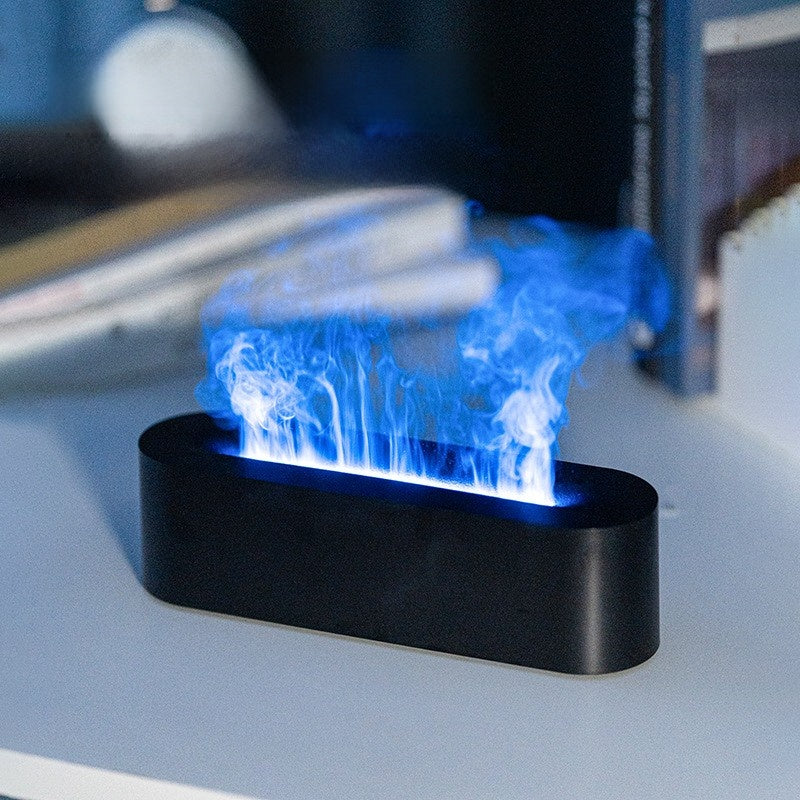 Fireplace Flame Aroma Diffuser with Remote Control and Humidifier
Difusor de aromas con forma de llama de chimenea, con control remoto y humidificador.
